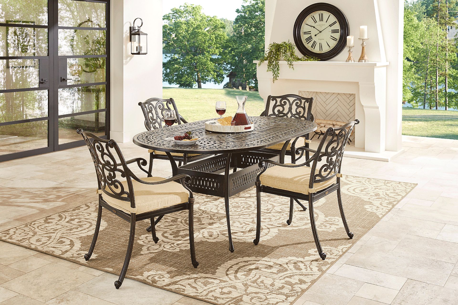 Cindy Crawford Home Lake Como Antique Bronze 5 Pc Oval Outdoor Dining Set with Gold Cushions - Image 1