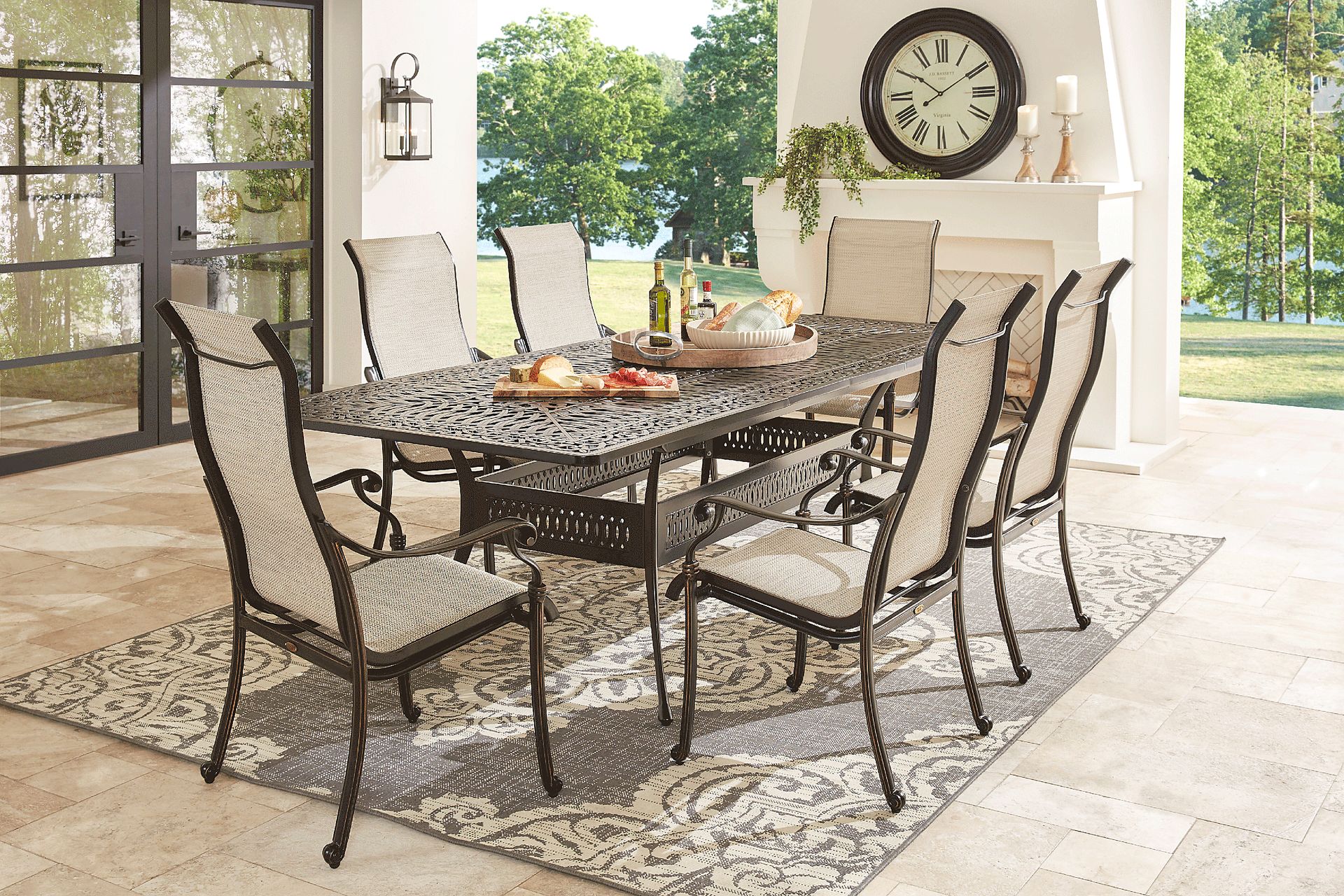 Cindy Crawford Home Lake Como Antique Bronze 7 Pc 72-102 in. Outdoor Dining Set with Sling Chairs - Image 1