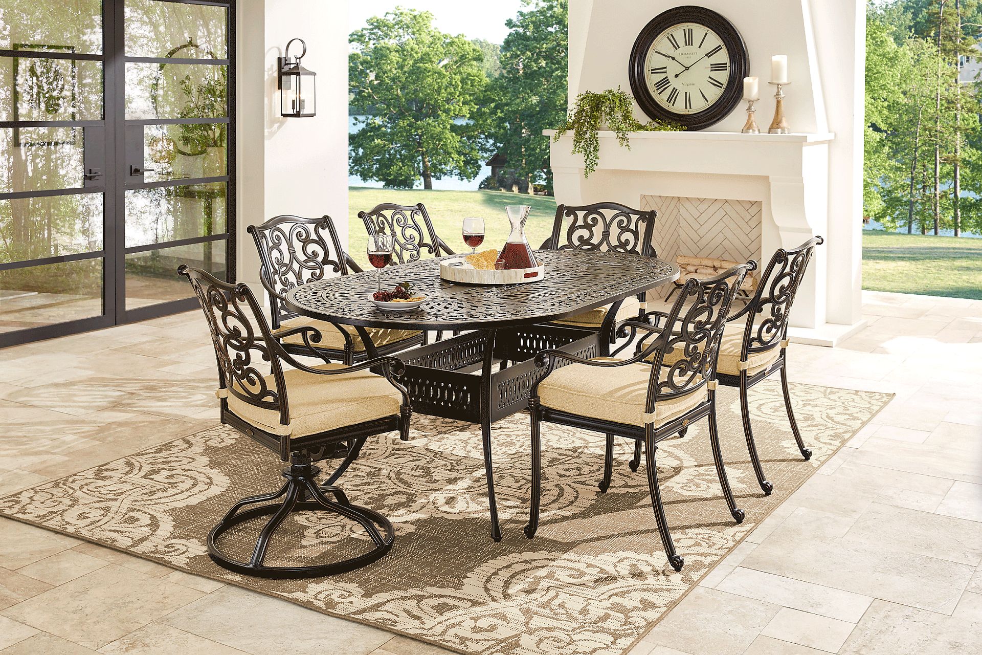 Cindy Crawford Home Lake Como Antique Bronze 7 Pc Oval Outdoor Dining Set with Gold Cushions - Image 1