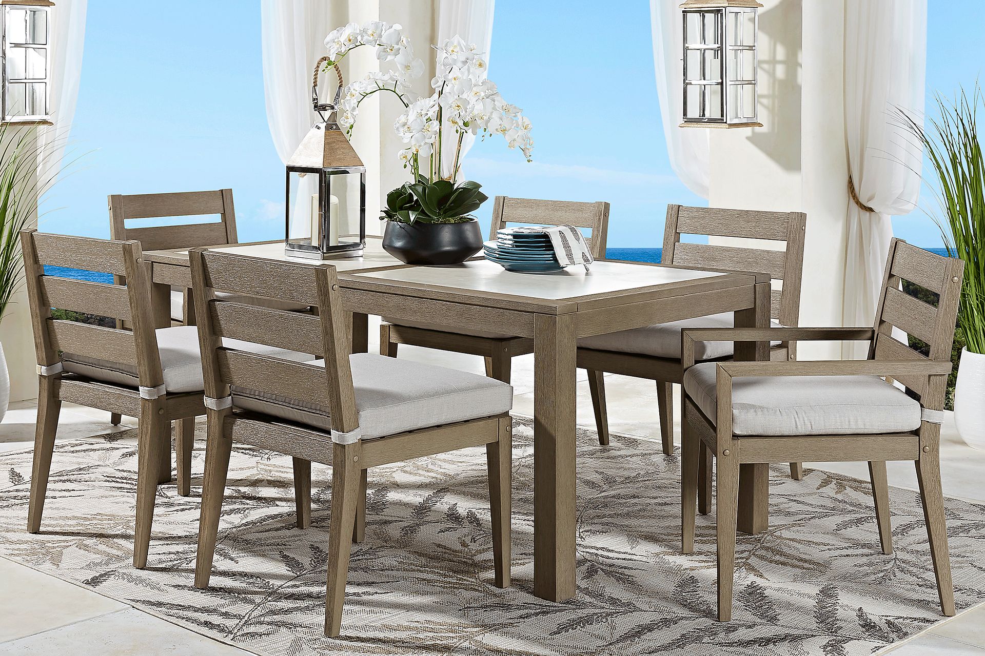 Lake Tahoe Gray 7 Pc Rectangle Outdoor Dining Set with Seagull Cushions - Image 1