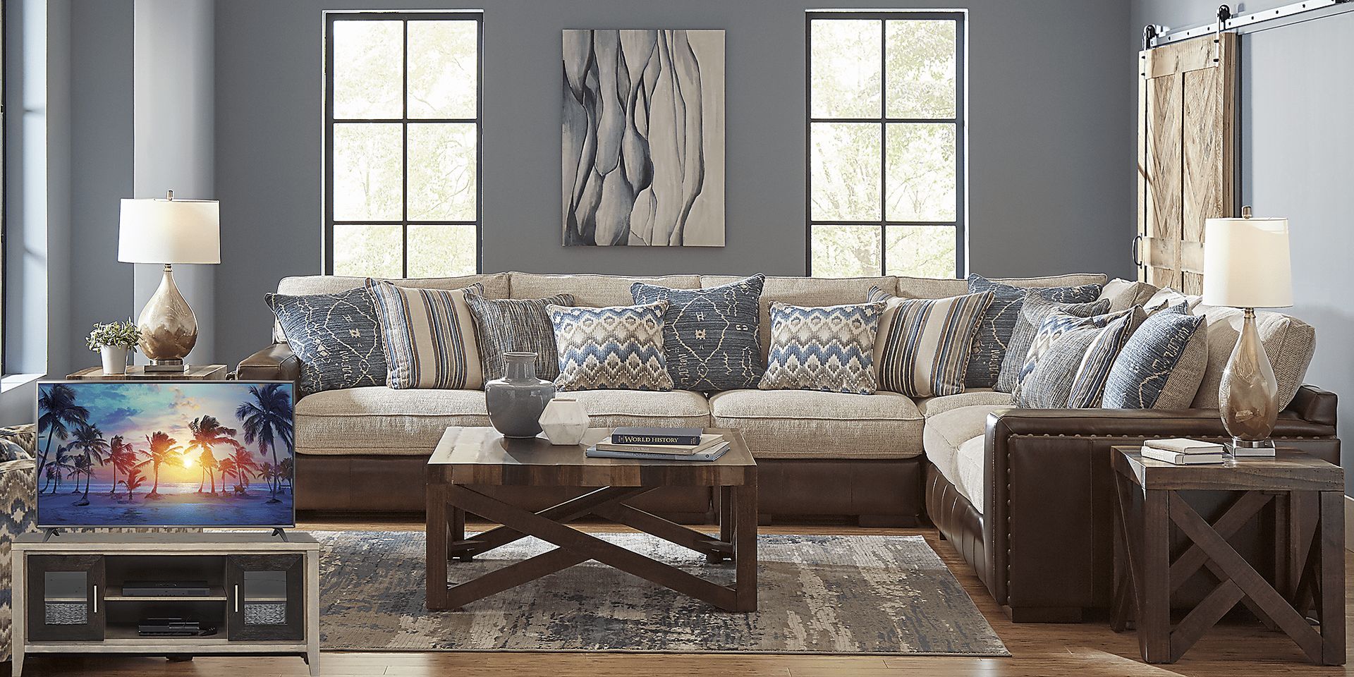 Cindy Crawford Home Telluride Falls Sand 7 Pc Sectional Living Room Plus 70 in. TV - Image 1
