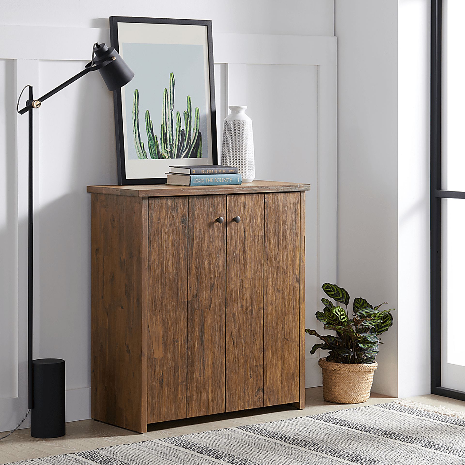 Clintom Natural Light Wood Accent Shoe Cabinet Rooms to Go