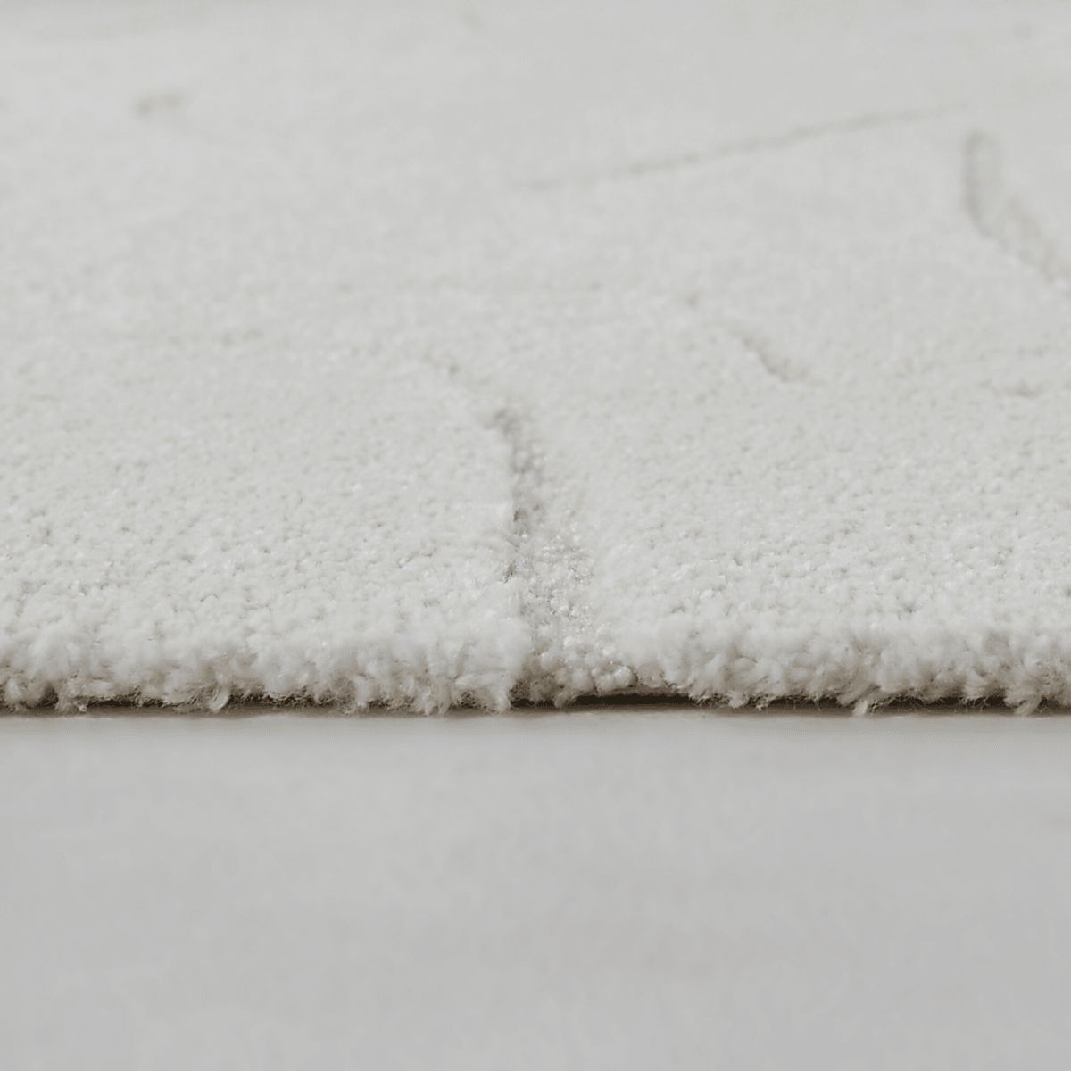 Coile Cream Beige Rugs | Rooms to Go