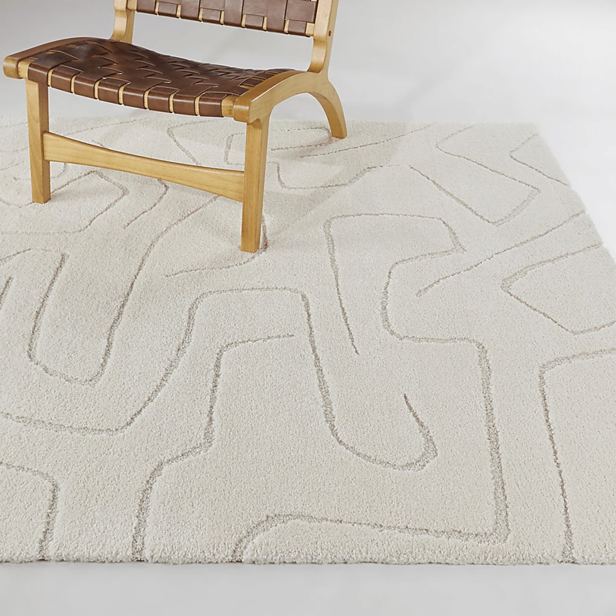 Coile Cream Beige Rugs | Rooms to Go