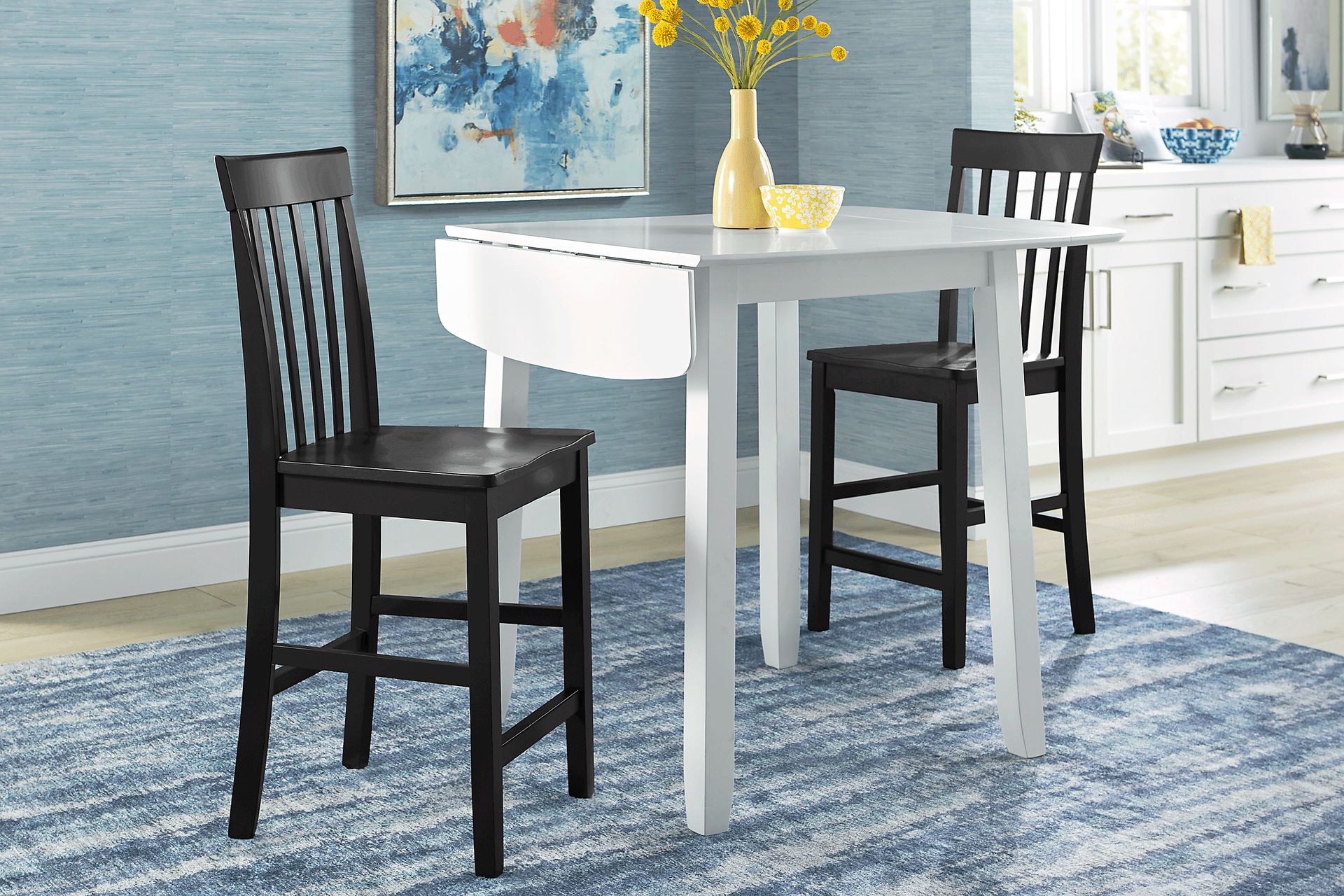 Concord White 3 Pc Counter Height Drop Leaf Dining Room with Black Slat Back Stools - Image 2