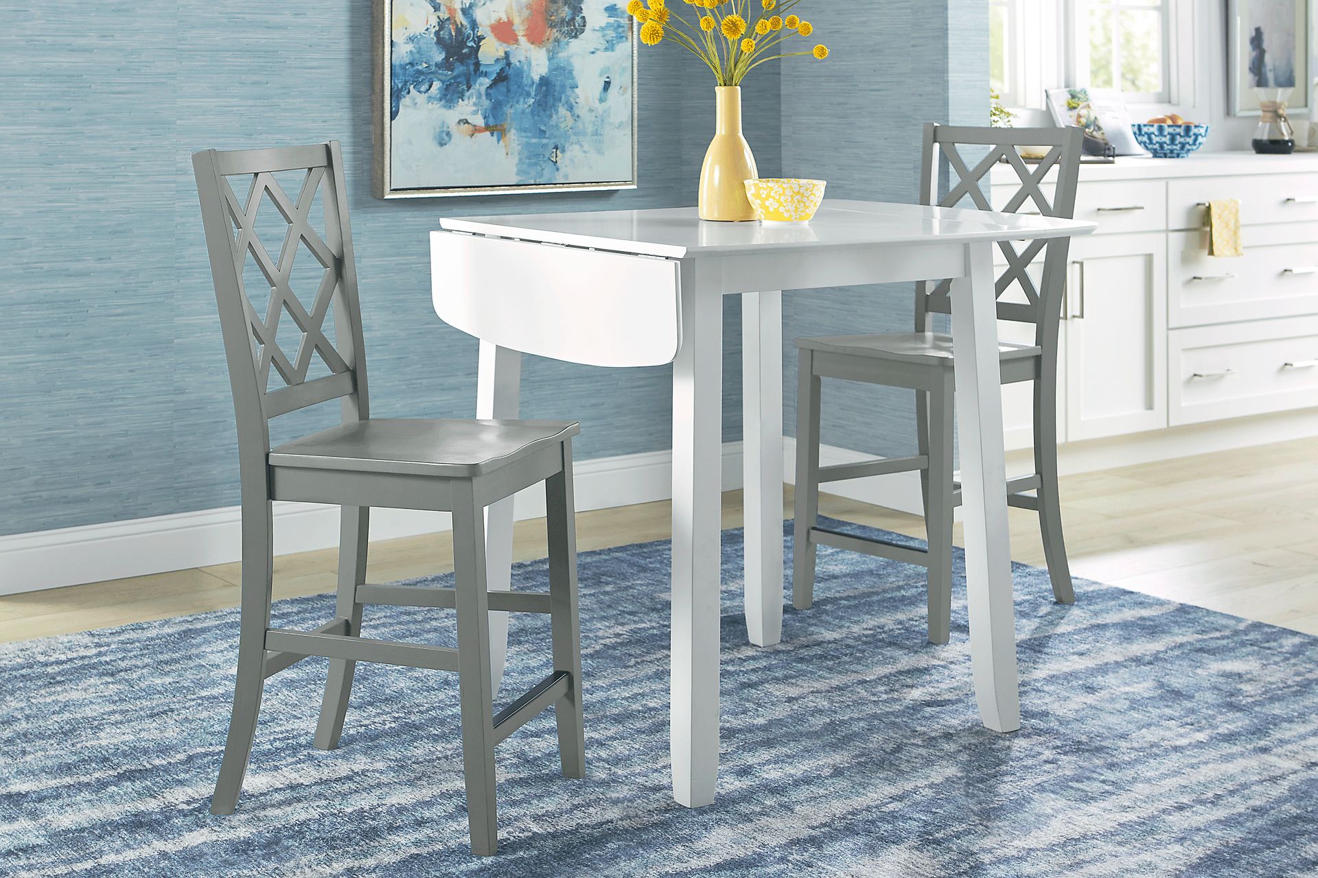 Concord White 3 Pc Counter Height Drop Leaf Dining Room with Gray Diamond Back Stools - Image 2