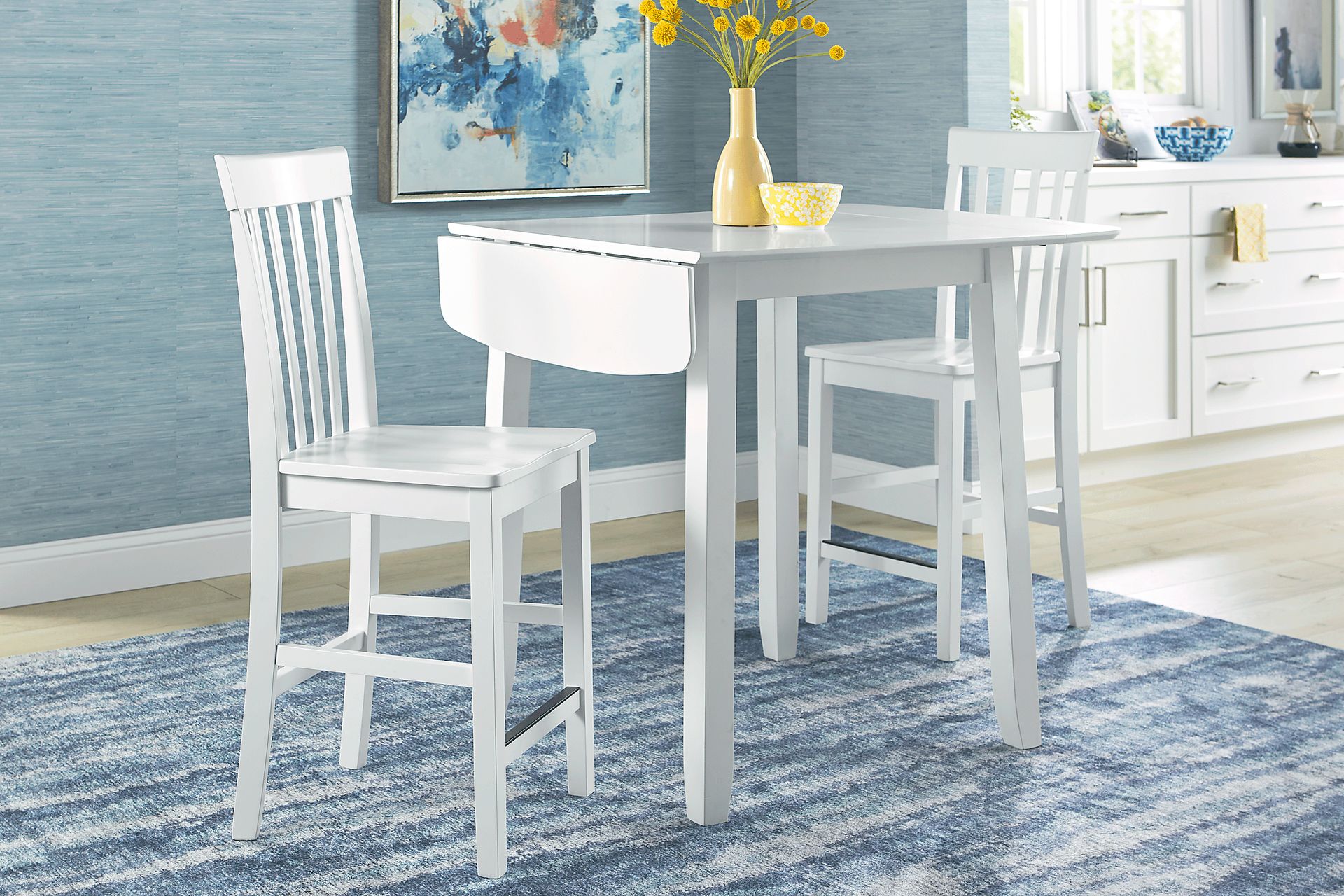 Concord White 3 Pc Counter Height Drop Leaf Dining Room with White Slat Back Stools - Image 2