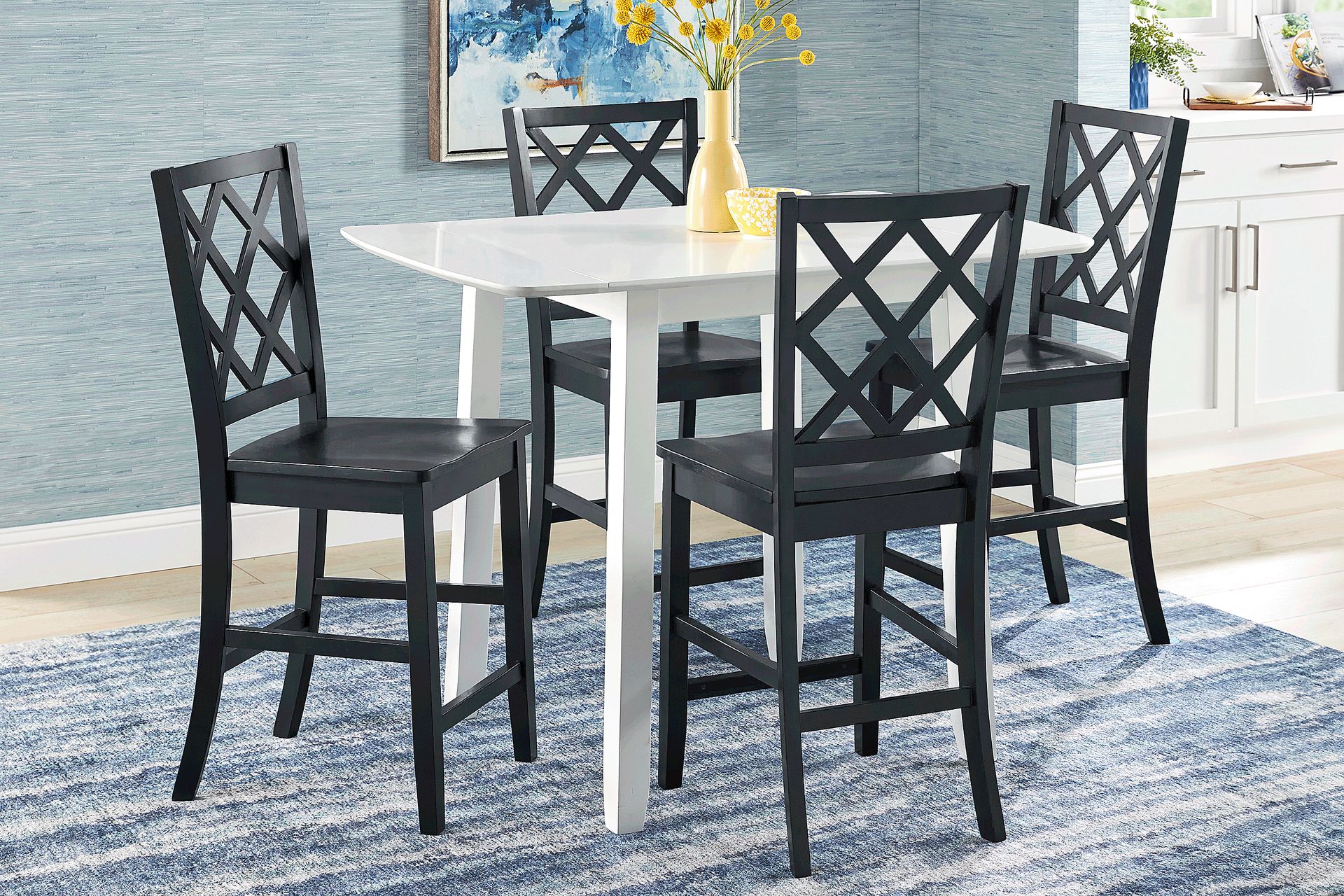 Concord White 5 Pc Counter Height Drop Leaf Dining Room with Black Diamond Back Stools - Image 1