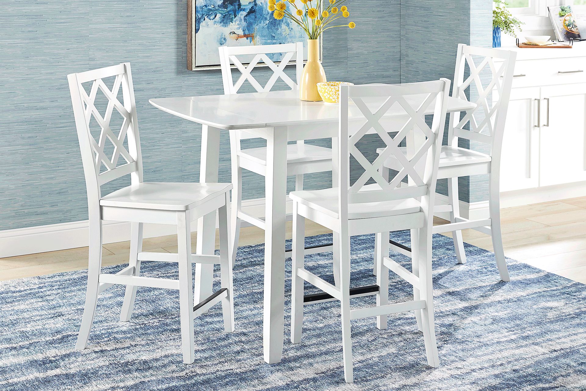 Concord White 5 Pc Counter Height Drop Leaf Dining Room with White Diamond Back Stools - Image 1