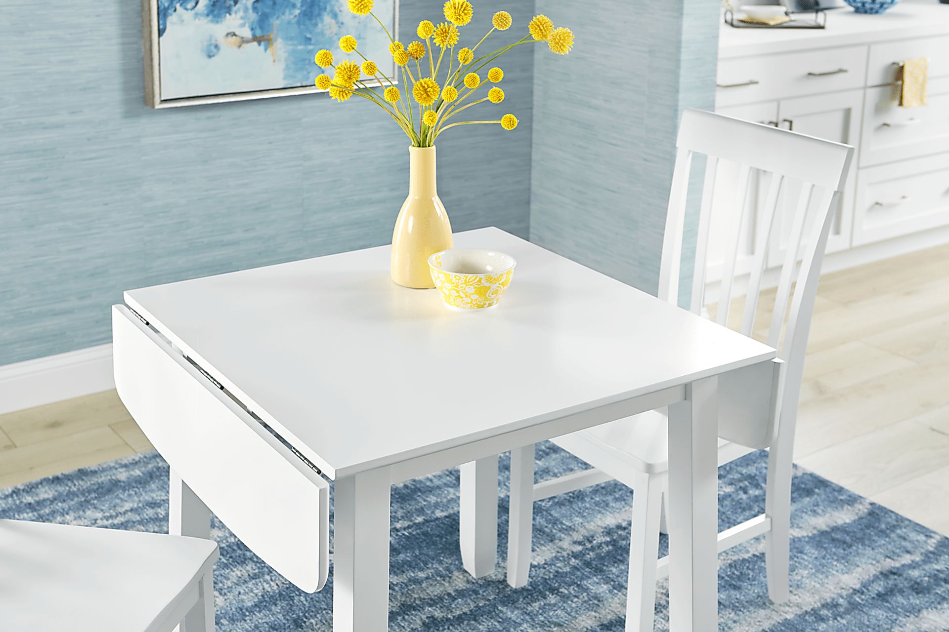 Concord White 5 Pc Drop Leaf Dining Room with White Slat Back Chairs - Image 7