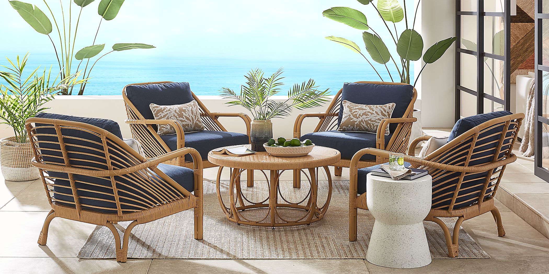 Coronado Sandstone 5 Pc Round Outdoor Chat Seating Set with Indigo Cushions