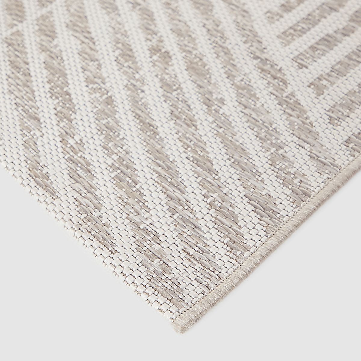 Cosgrove Light Taupe Beige Polypropylene Fabric Outdoor Rug | Rooms to Go