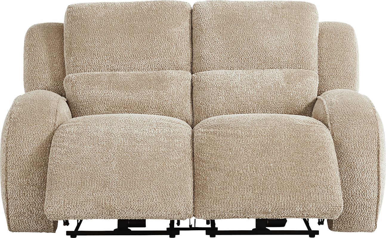 Crestwood Tan Reclining Loveseat