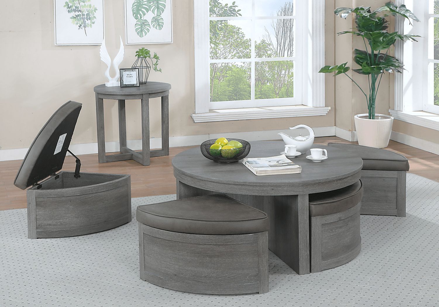 https://assets.roomstogo.com/product/darien-gray-3-pc-table-set-with-storage-ottomans_2201997P_image-item?cache-id=f7565c12f124d2461d3f6f5a79a062eb,