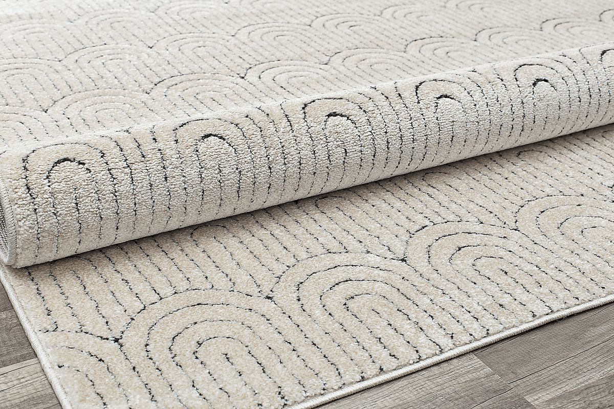 Davelynn Tan Beige,Brown Rug | Rooms to Go