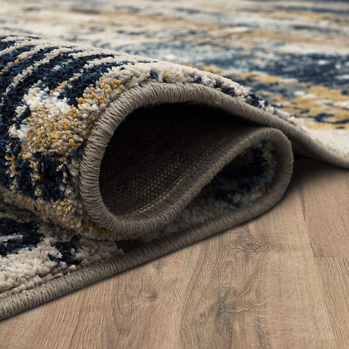 Drew & Jonathan Dawnshire Blue Rugs | Rooms to Go