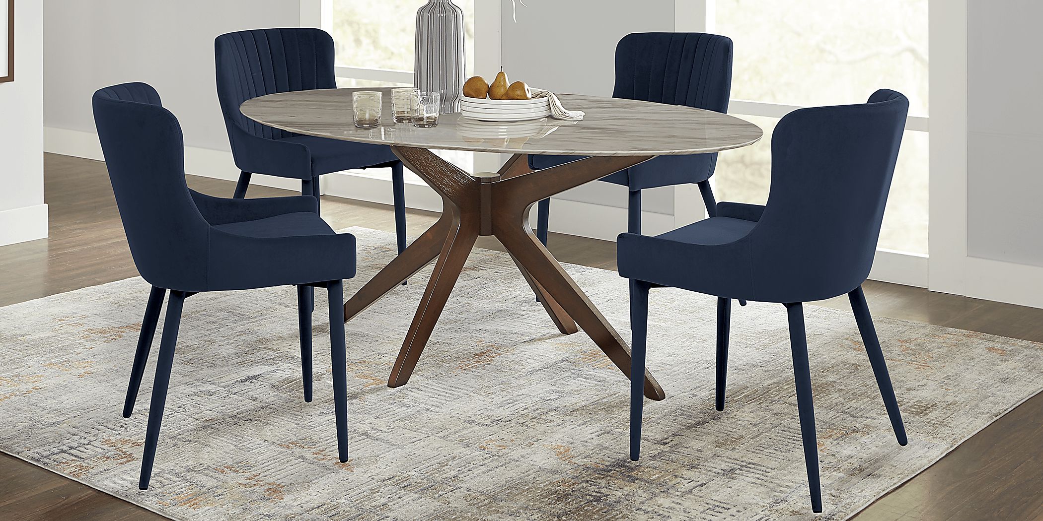 Delmon White 5 Pc Oval Dining Set with Navy Side Chairs Rooms To Go