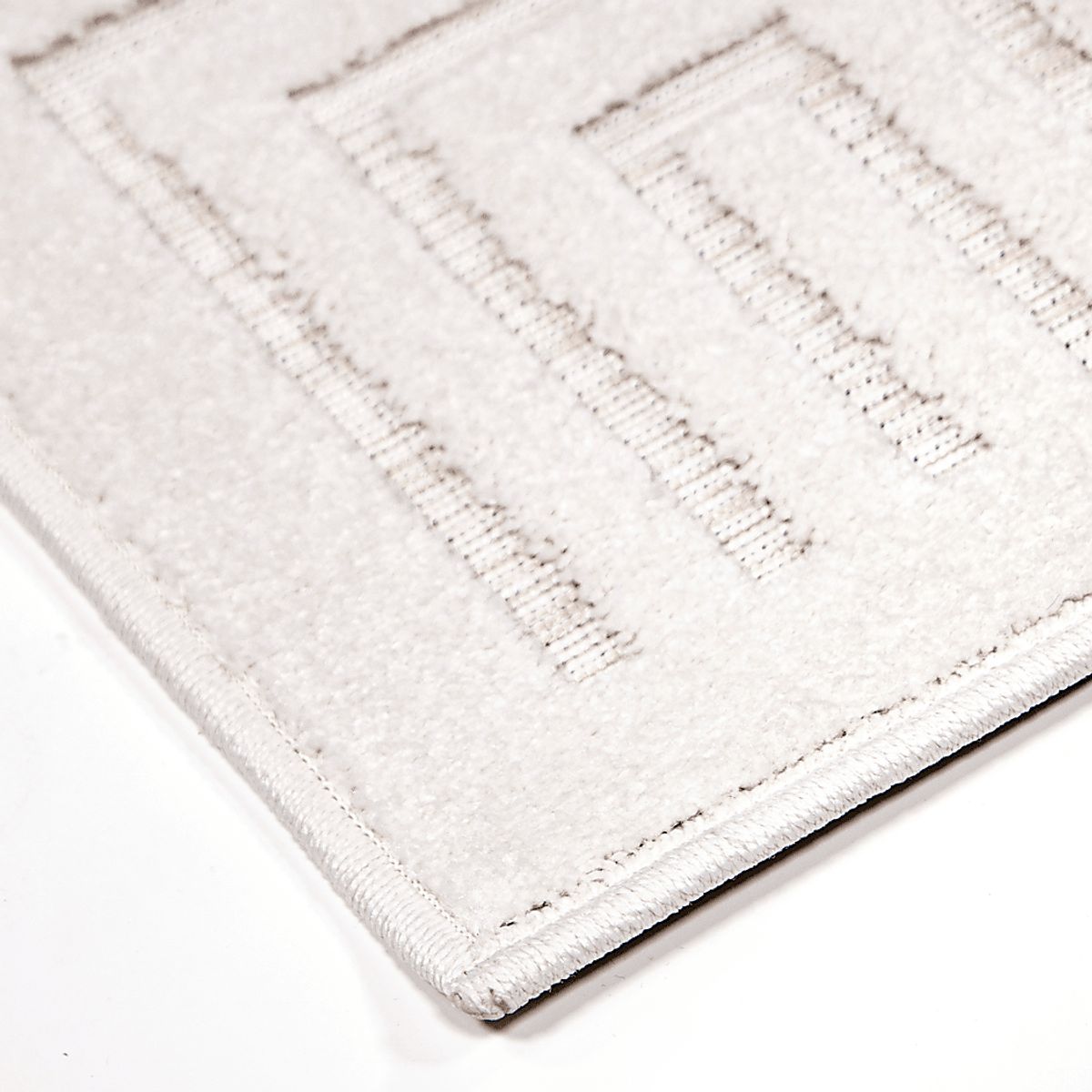 Denbigh Beige Polypropylene Fabric Rug | Rooms to Go