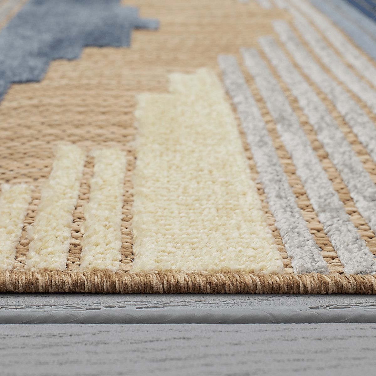 Derose Bay Blue Outdoor Rugs | Rooms to Go