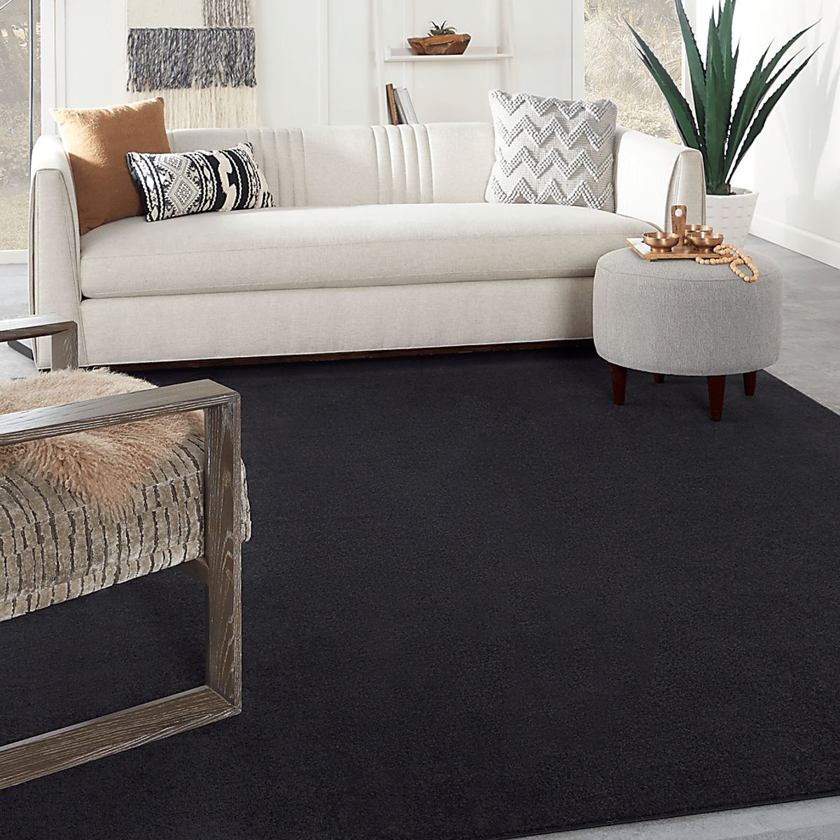 Easthagen Black Rugs | Rooms to Go