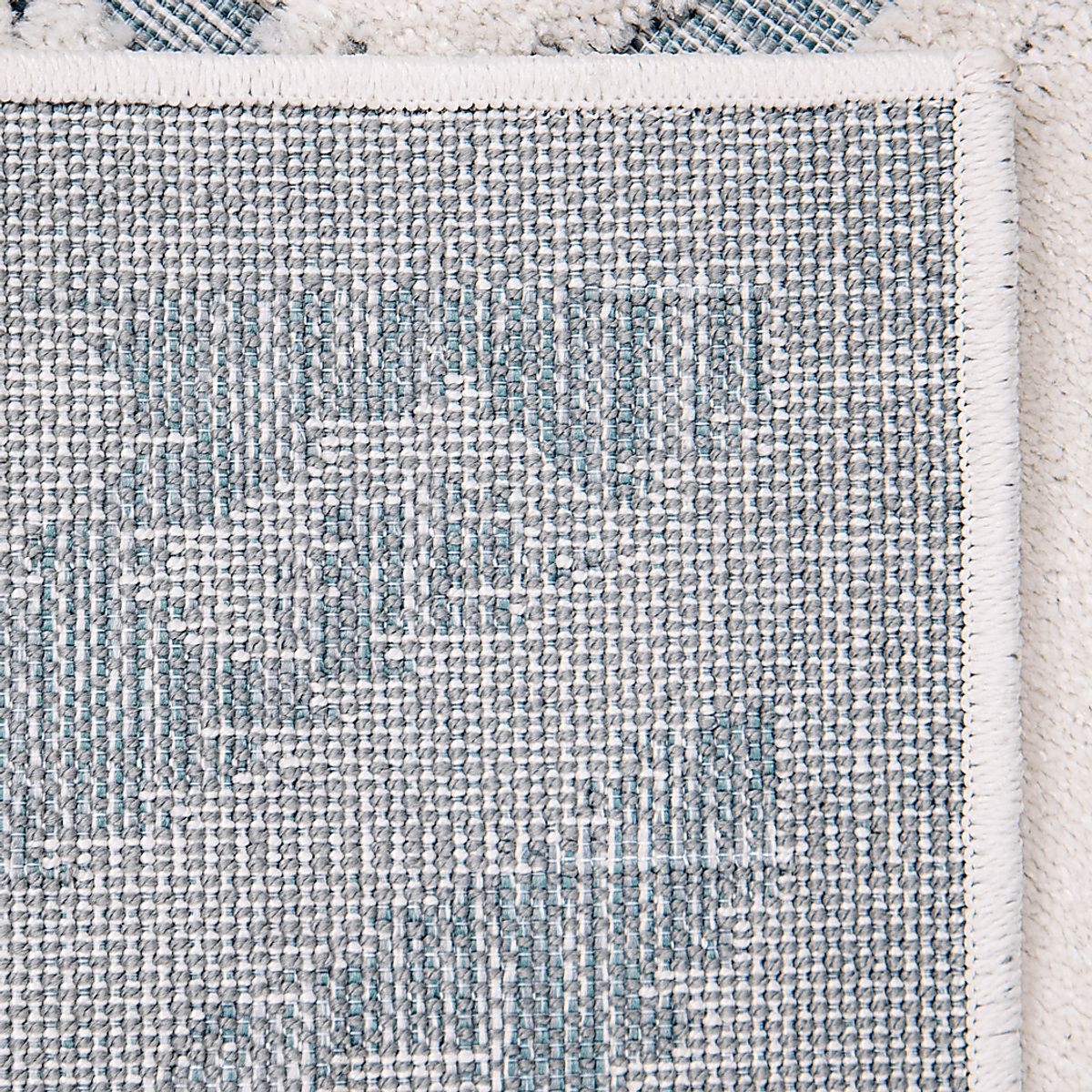 Edingale White Polypropylene Fabric Rug | Rooms to Go