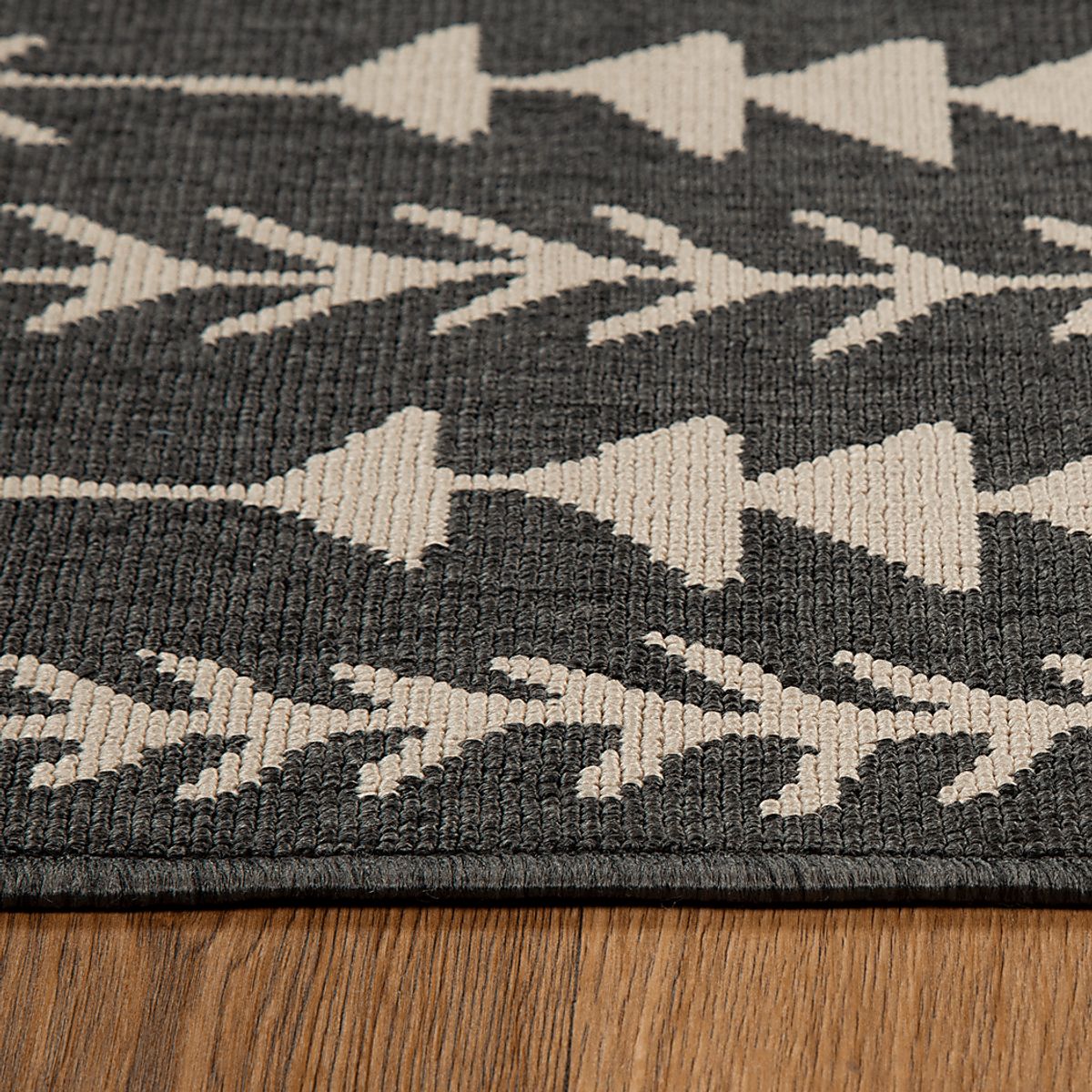Blackwood Black,Ivory Beige,Black Outdoor Rugs | Rooms to Go