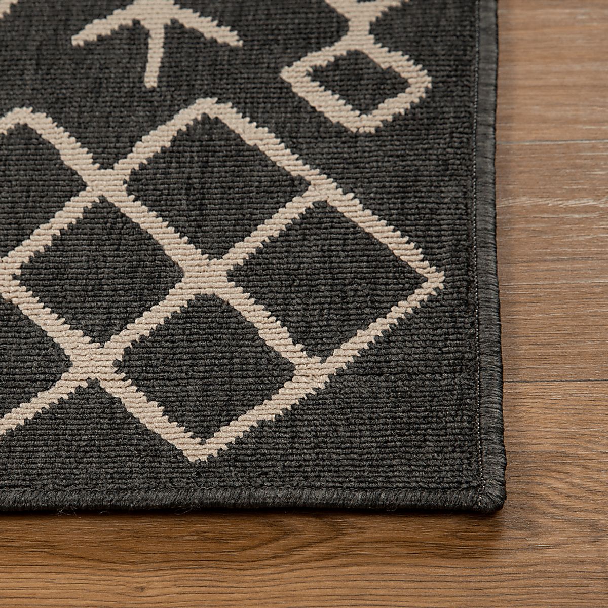Blackwood Black,Ivory Beige,Black Outdoor Rugs | Rooms to Go