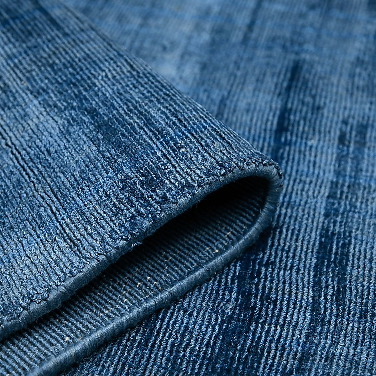 Evita Blue Viscose Rug | Rooms to Go
