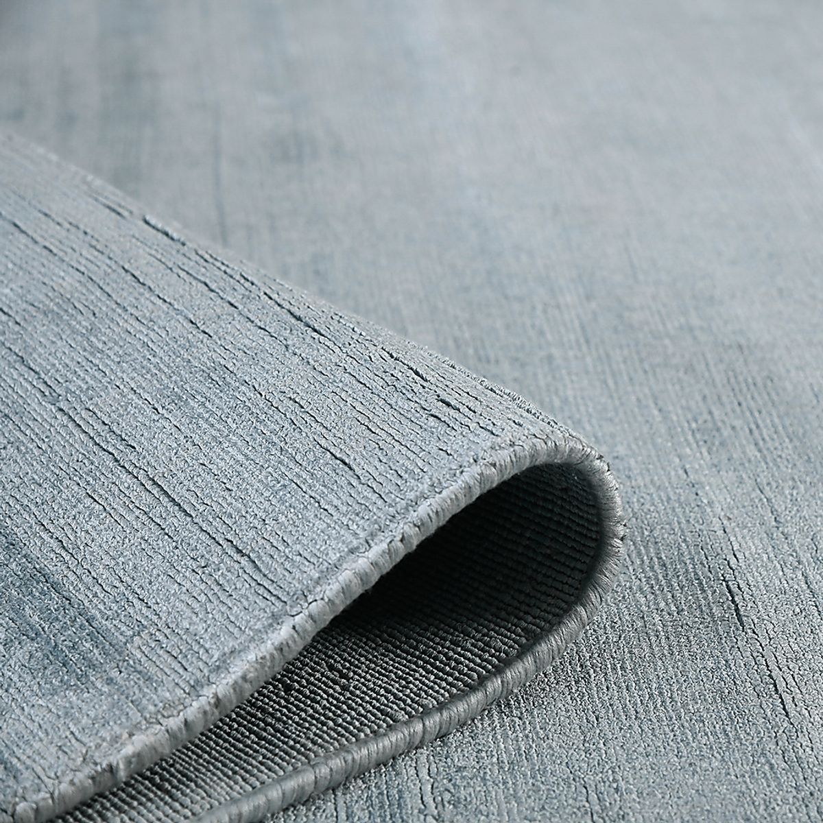 Evita Light Blue Viscose Rug | Rooms to Go