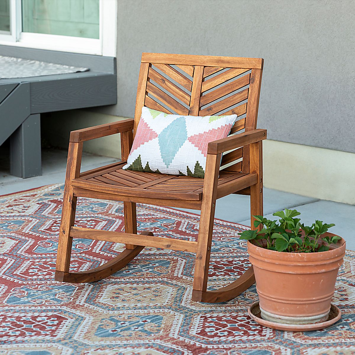 Fencerow Brown Wood Outdoor Rocking Chair | Rooms to Go