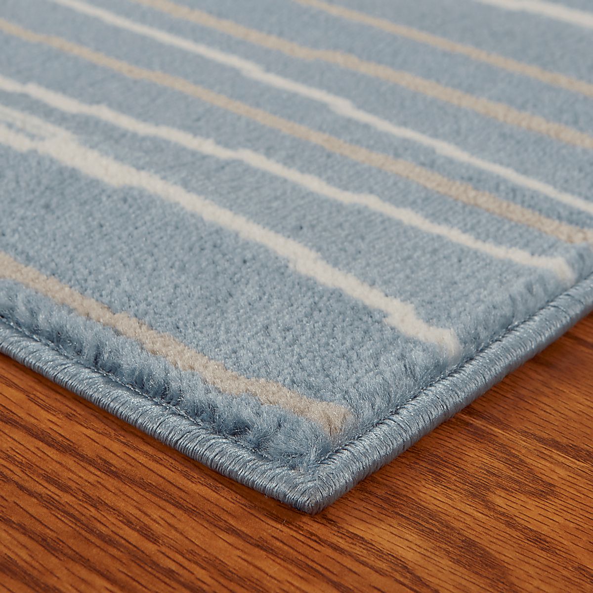 Fioraleah Blue Rug | Rooms to Go