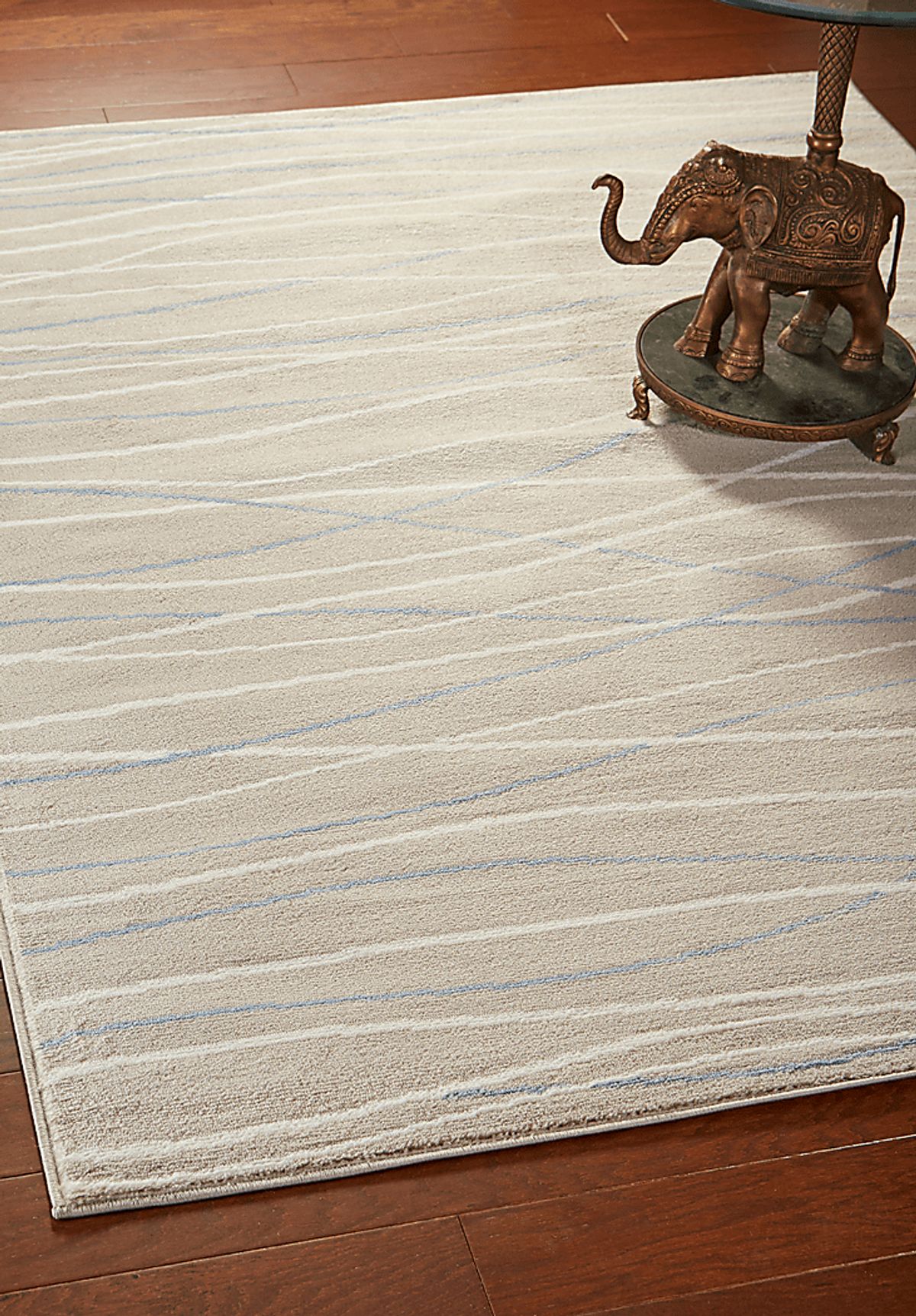 Fioraleah Taupe Beige Rug | Rooms to Go