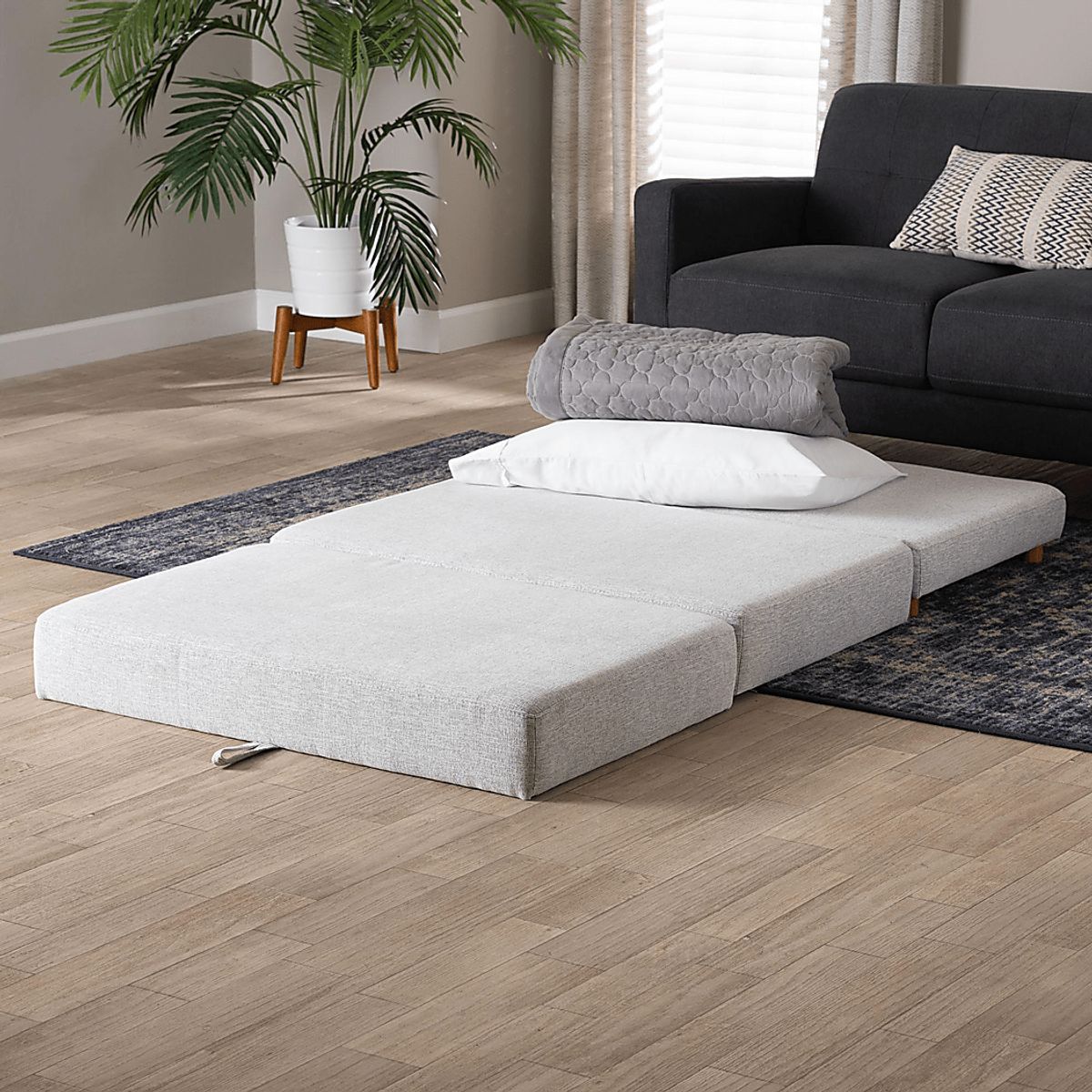 Gumsprings Light Gray Polyester Fabric Ottoman | Rooms to Go