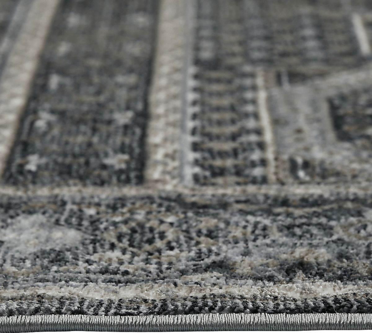 Haertley Charcoal Black,Gray Rugs | Rooms to Go