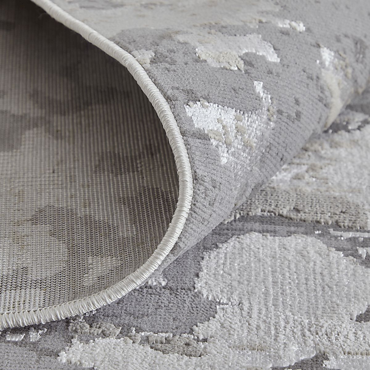 Iariko Gray,Silver,White Gray,White Rugs | Rooms to Go
