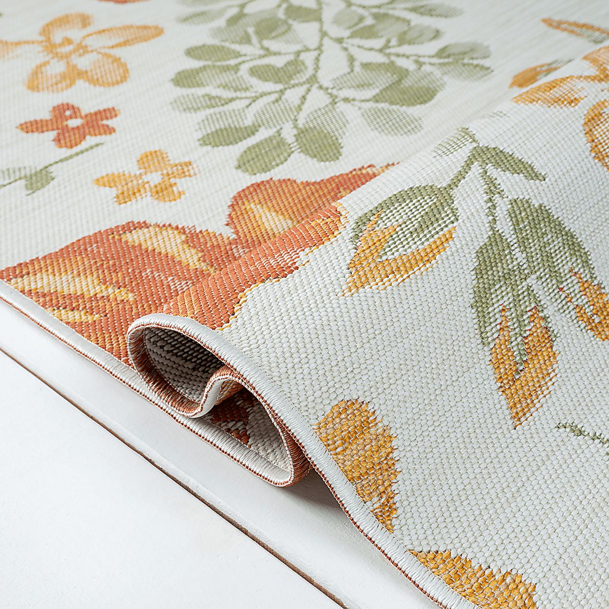 Ismaela Ivory,Orange Beige,Orange,Red Outdoor Rugs | Rooms to Go