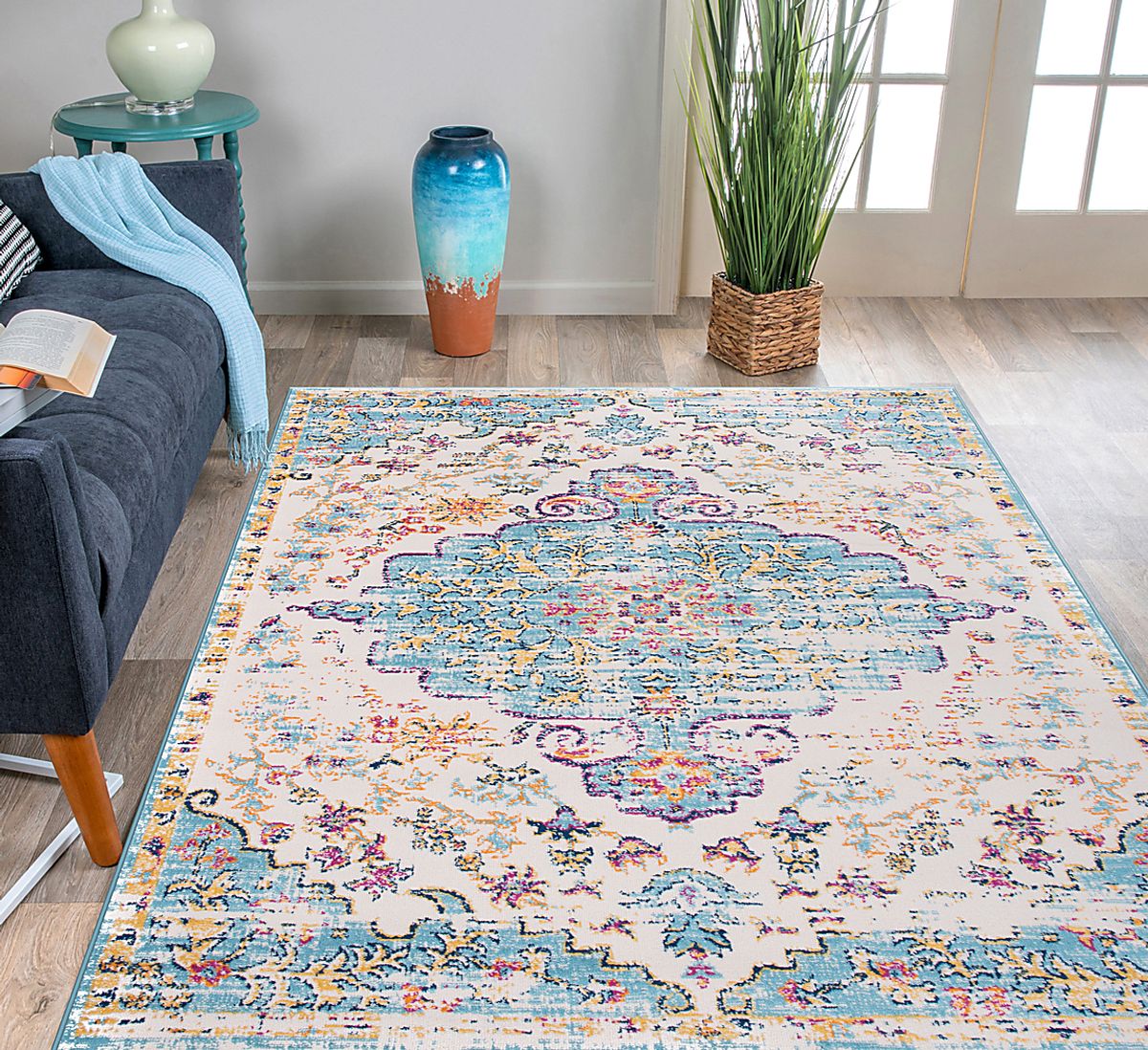 Jasbir Turquoise Blue Rug | Rooms to Go