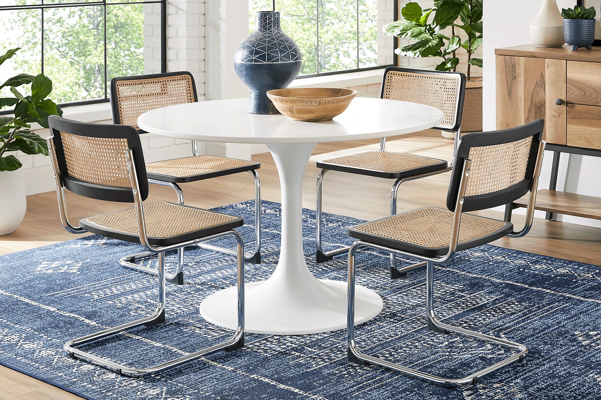 Kaarina White 5 Pc Round Dining Room with Black Cane Chairs - Image 1