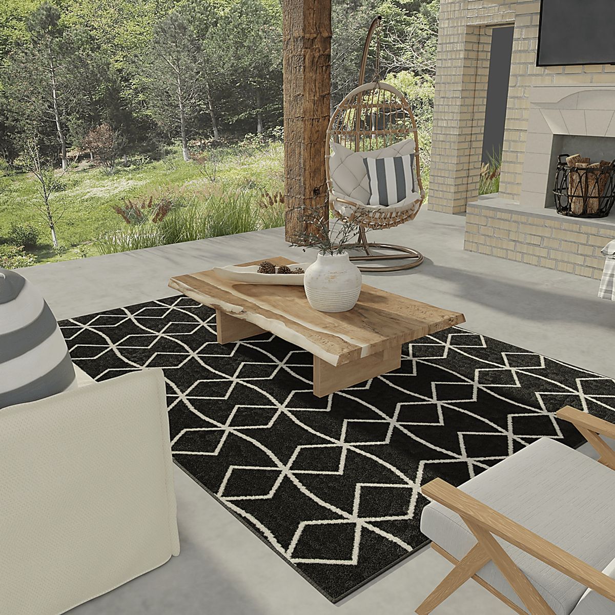 Kaikara Black Outdoor Rugs | Rooms to Go