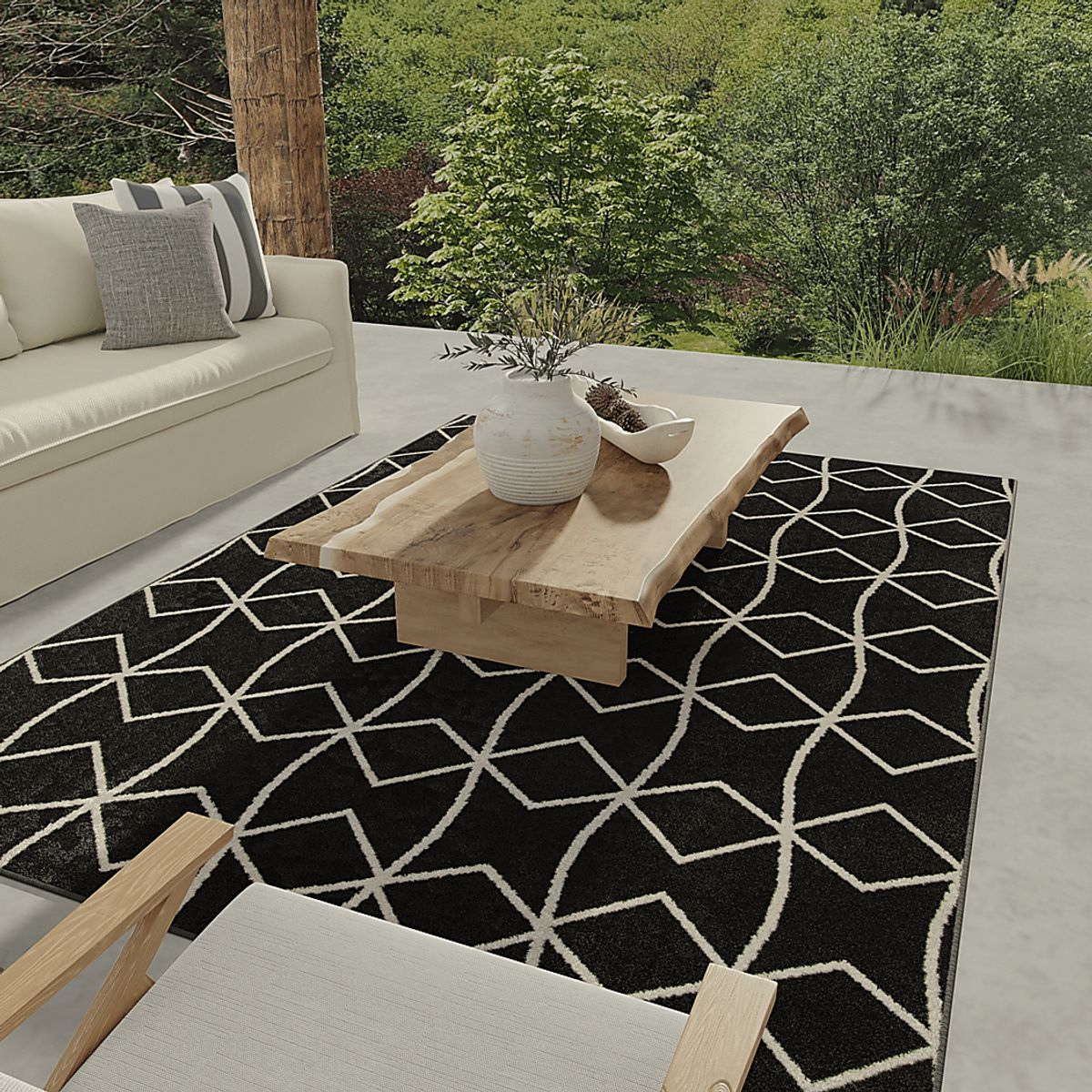 Kaikara Black Outdoor Rugs | Rooms to Go