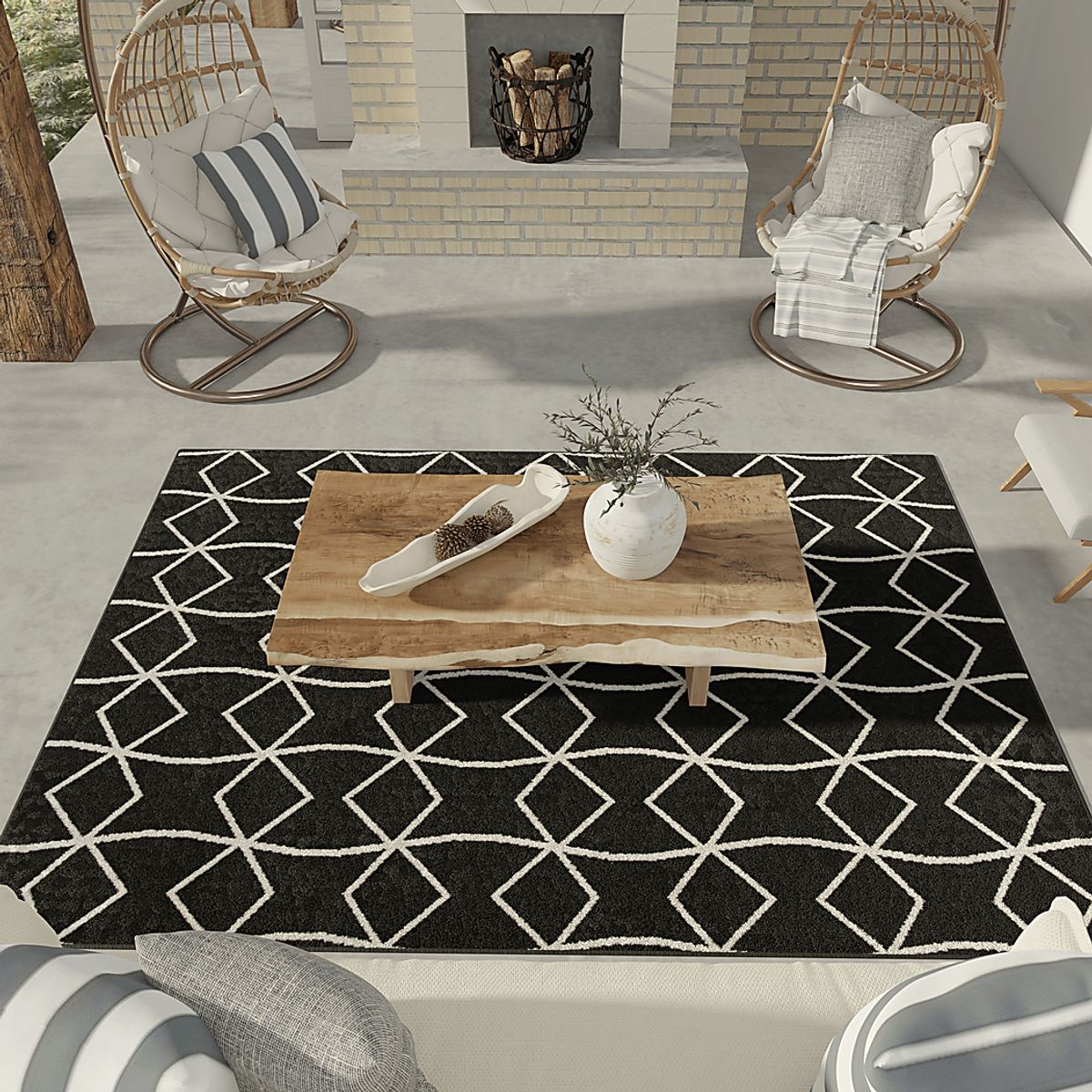 Kaikara Black Outdoor Rugs | Rooms to Go