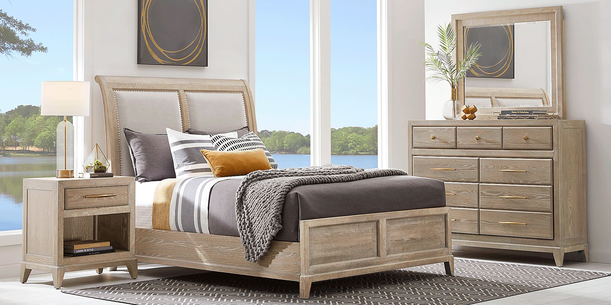 https://assets.roomstogo.com/product/kailey-park-light-oak-7-pc-king-sleigh-bedroom_8381989P_image-room?cache-id=446d2d655cf3f87cb59f1b323ab14821