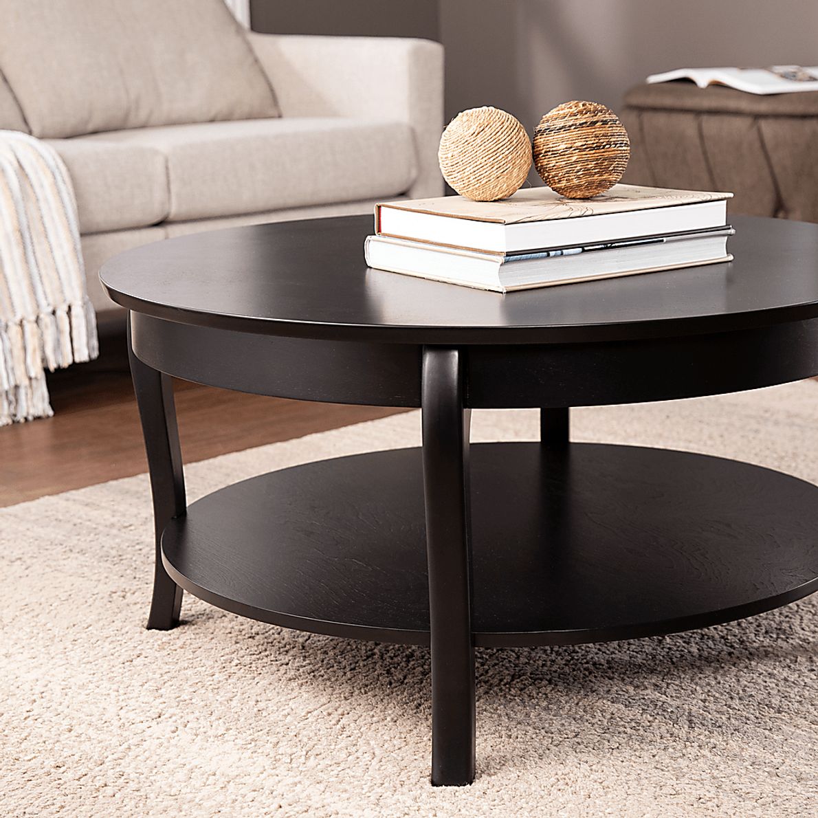 Katzman Black Round Cocktail Table - Rooms To Go