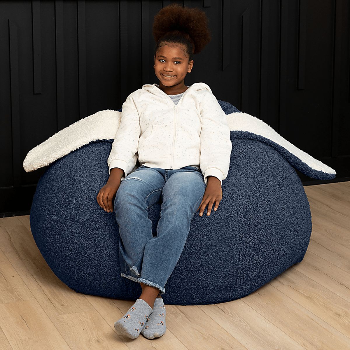 Raven-Symoné Hopseat Bunny Blue Faux Shearling Bean Bag Chair | Rooms to Go