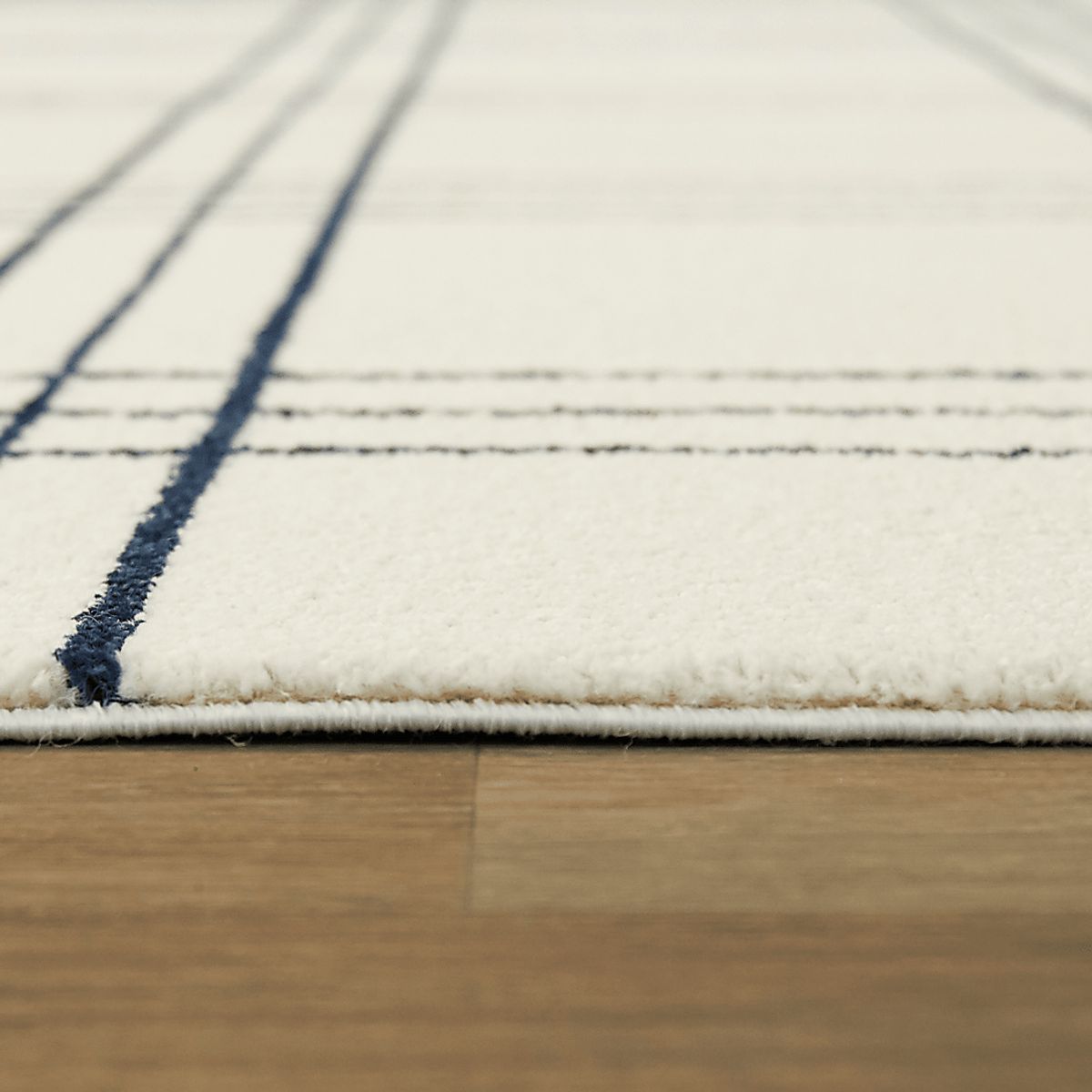 Posh Stripes White Polypropylene Fabric Rug | Rooms to Go