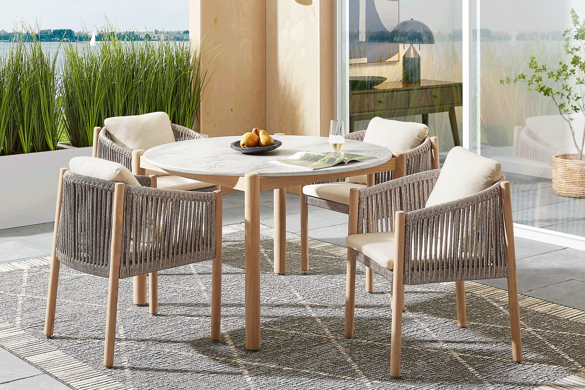 Koda Natural 5 Pc Round Outdoor Dining Set with Beige Arm Chairs - Image 1