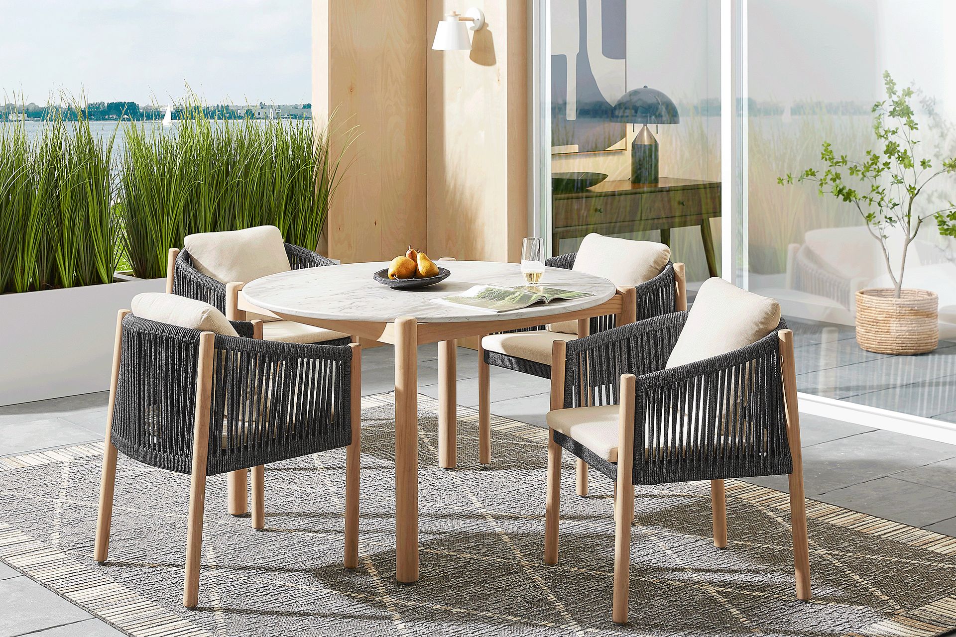 Koda Natural 5 Pc Round Outdoor Dining Set with Charcoal Arm Chairs - Image 1