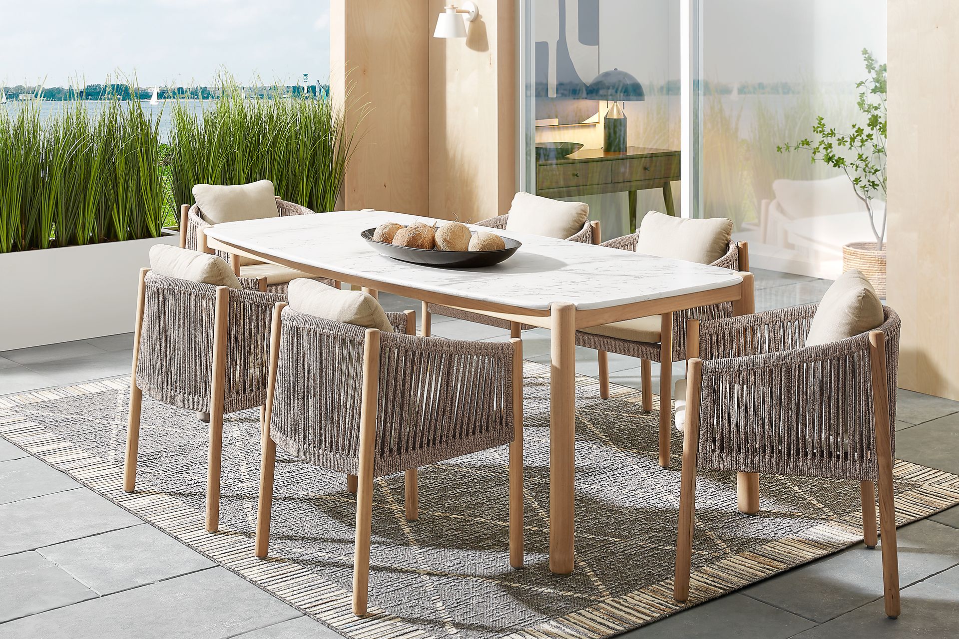 Koda Natural 7 Pc Outdoor Dining Set with Beige Arm Chairs - Image 1