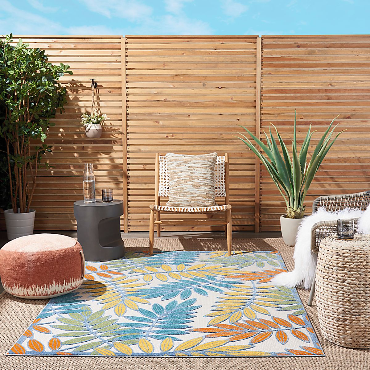 Krisiel Ivory/Multi Blue Rugs | Rooms to Go