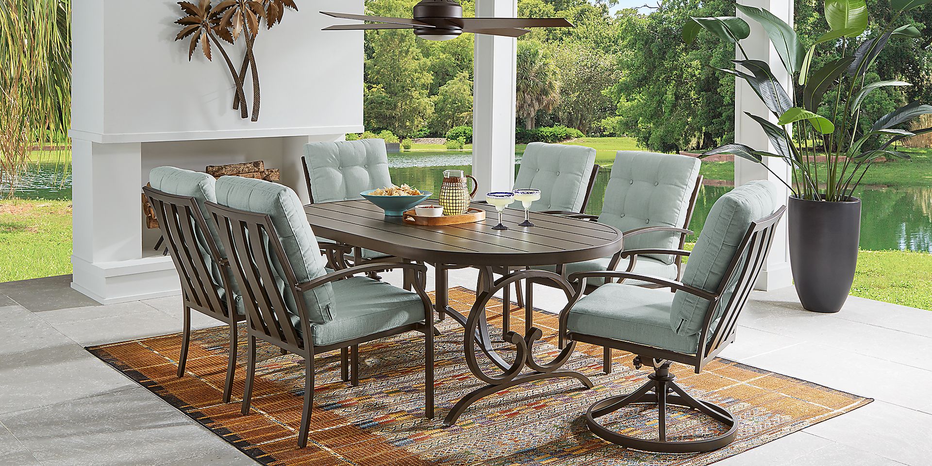 Lake Breeze 5 Pc Bronze Metal Mist Blue Aluminum Outdoor Dining Set With Dining Chair 78 In. Oval Dining Table Rooms to Go